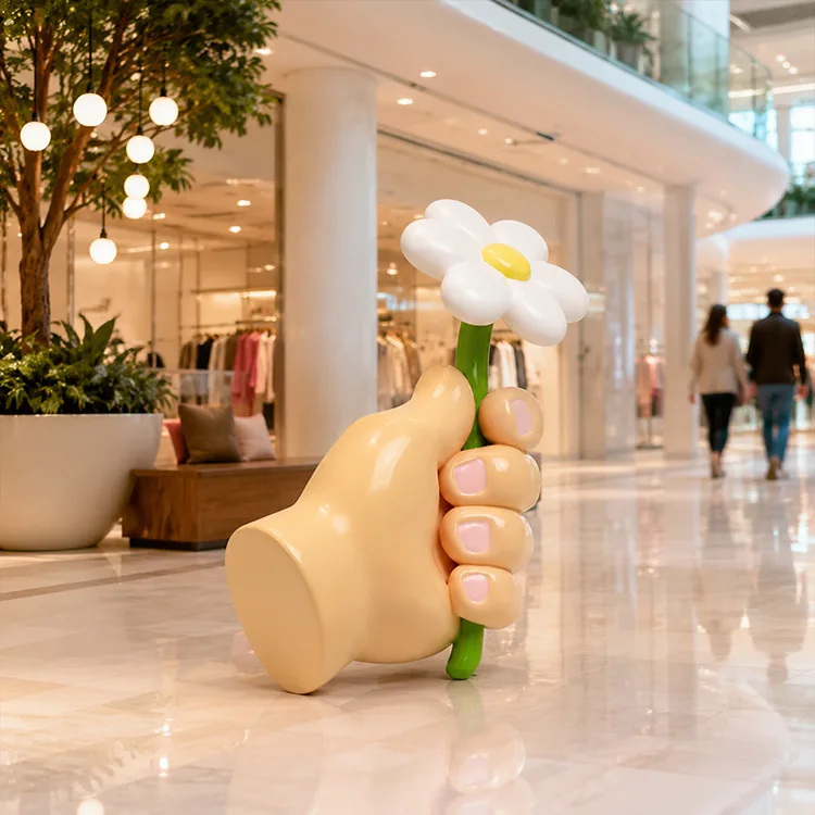 Escultura de flor de mano
